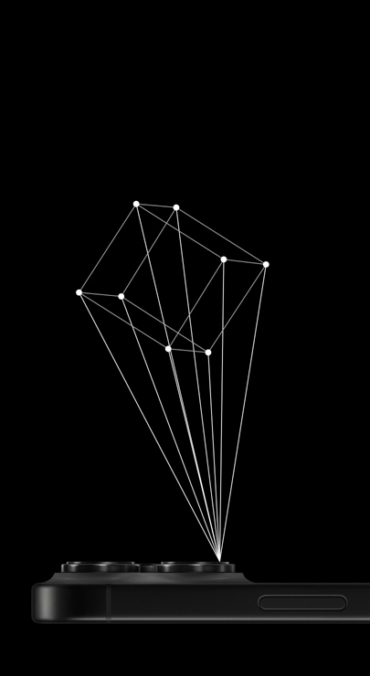 Um iPhone está com a tela virada para baixo, projetando o contorno de um cubo 3D a partir do Scanner LiDAR