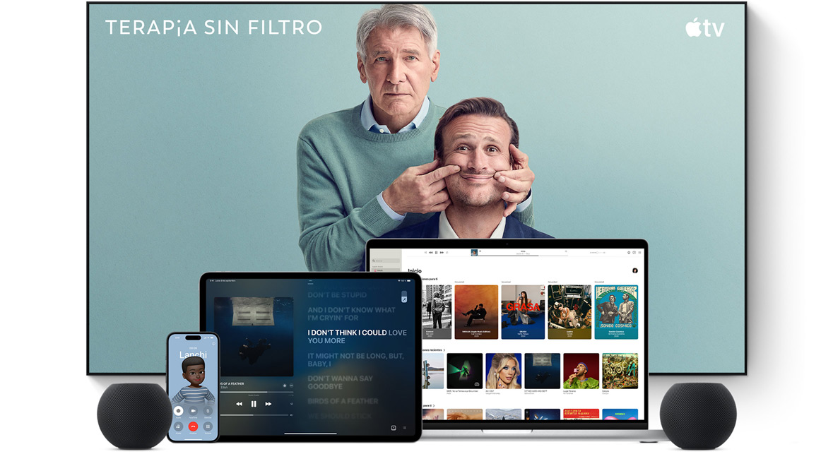 Large flat screen television showing two male characters from the Apple TV series shrinking. A MacBook Pro, an iPad, an iPhone, and a Midnight HomePod mini are arranged in front.