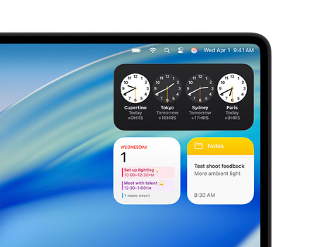 Macin työpöydällä on macOS Tahoe ja erilaisia widgettejä, mukaan lukien Kello, Kalenteri ja Muistiinpanot.
