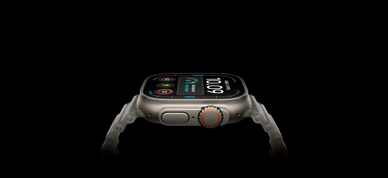 Apple Watch Ultra 4, titanium case, natural color, right exterior, Digital Crown, raised side button, digital watch face, translucent gray Ocean Band
