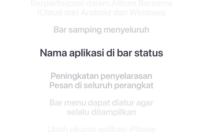 Daftar fitur secara vertikal, dengan “Peningkatan penyelarasan Pesan di semua perangkat” ditampilkan dengan huruf tebal di tengah. Fitur-fitur sekitarnya memudar menjadi latar belakang di atas dan di bawah.