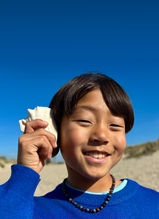 Photo taken with 48MP Fusion camera, next-generation portraits feature in use, focused on a person's face