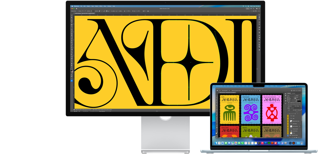 Studio Display and a Mac laptop showing a project being worked on in multiple Adobe programs, Studio Display shows a closeup on black text against a rich yellow background, the anti-reflective coating helps reduce glare