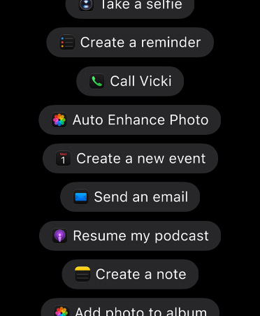 Screen with requests for Siri AI including, Take a selfie, Create a reminder, Call Vicki, Rotate photo left, Create a new event, Send an email, Resume my podcast, Create a note, Add photo to album