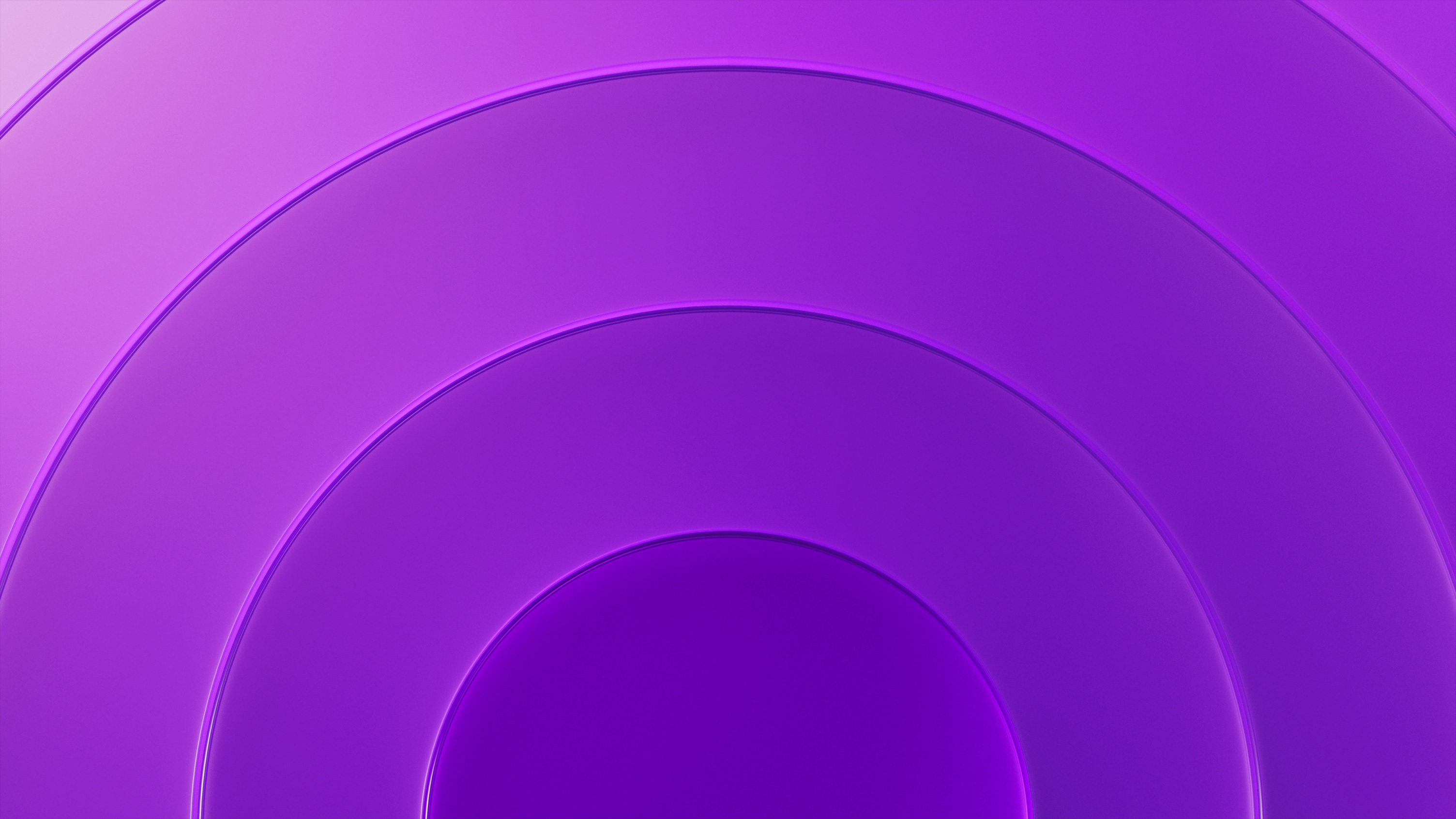 Four oval rings with a deep purple gradient that gets darker as it gets further from the centre ring.