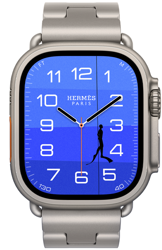 Apple Watch Hermès Ultra 4, Fathom and Wonder analogue watch face (hour, minute and second hands, Depth complication, with an orange buoy floating on top of a turquoise sea with a gradient from light to dark blue), titanium case, natural colour, right side exterior, Digital Crown, raised side button, paired with Grand H Titane strap, Gris Titane colour