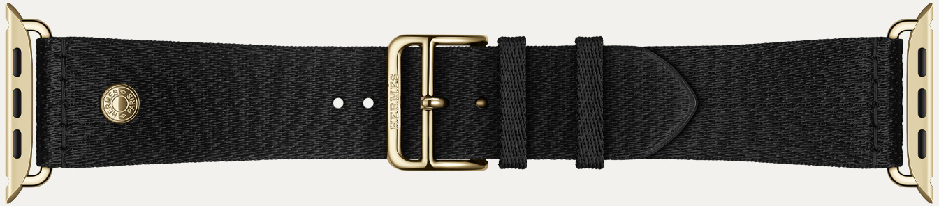 Apple Watch Hermès Series 12 Noir Satin Clou de Selle strap detail, smooth black satin webbing with radiant gold hardware