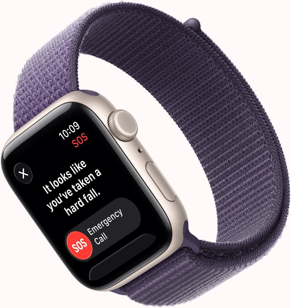 Apple Watch SE 3, carcasă din aluminiu, culoare Strălucire stelară, notificare S.O.S. Detectare cădere, butoane pentru apeluri de urgență și Sunt bine, exterior dreapta, Digital Crown, microfon, buton lateral, curea, brățară Sport, culoare Ceață mov