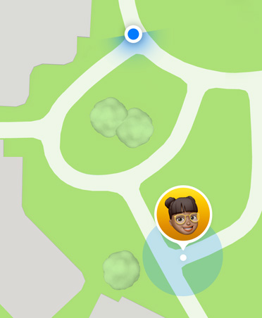 Maps interface with a blue dot indicating the parent or guardian’s location along with a child’s Memoji, indicating the child’s location.