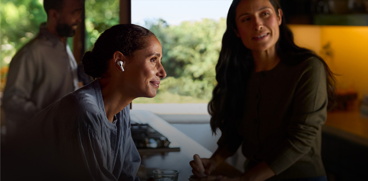 A woman wearing AirPods 2.