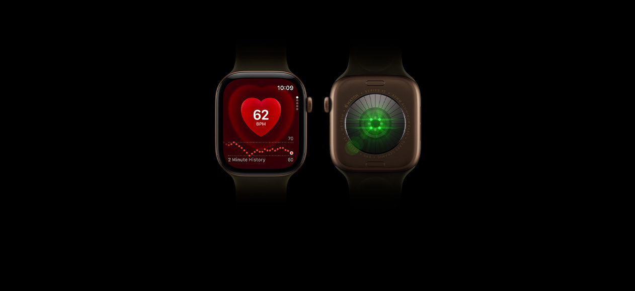 Dois dispositivos Apple Watch Series 12 com caixa em alumínio na cor bronze escuro e Bracelete desportiva na cor azeitona: um a mostrar a parte frontal do relógio com a app Frequência cardíaca e o outro com a vista traseira a mostrar o sistema de monitorização da saúde com luzes LED verdes