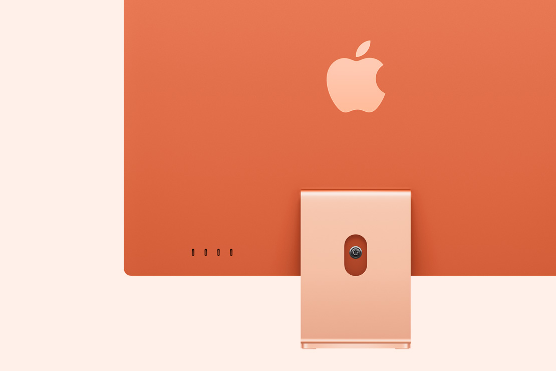 Oranž iMac tagantvaates, mis toob esile neli USB‑C liidest