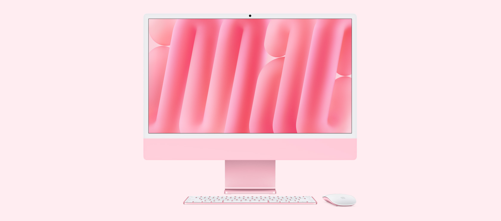 Roosa iMac eestvaates koos sama värvi hiire ja klaviatuuriga