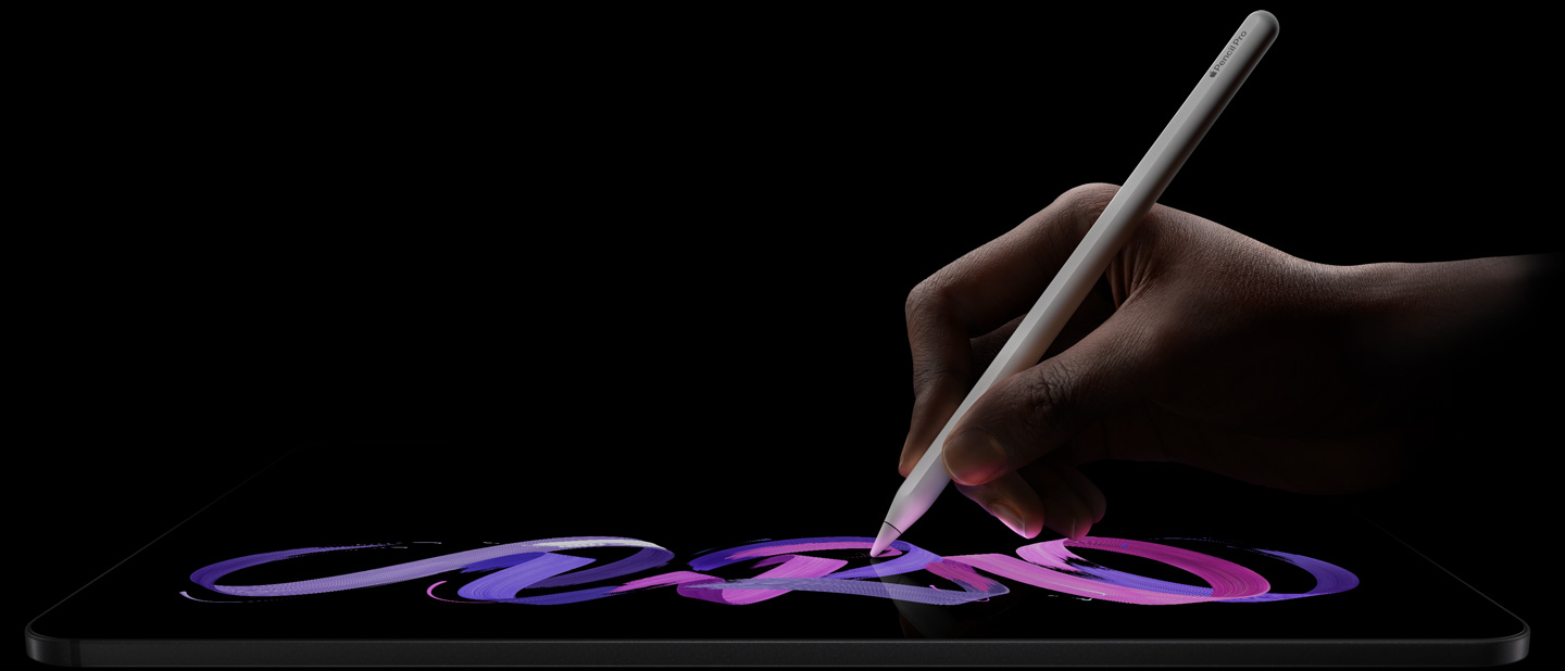 iPad Pro, front exterior, landscape orientation, side profile, space black colour, hand holding Apple Pencil Pro, white colour, drawing abstract purple and pink design on display