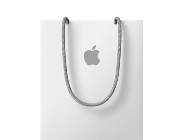Appleの白いショッピングバッグ。上の方にAppleのロゴが付いている