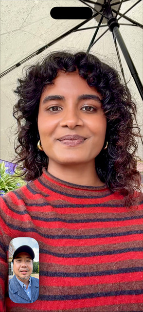 iPhone Air, front exterior, Centre Stage for video calls feature in use with two people on a FaceTime call