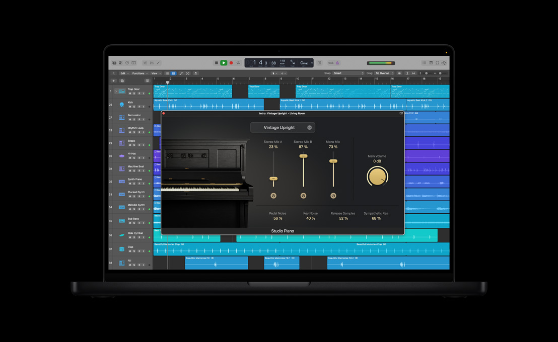 MacBook Pro 16 screen showing Studio Piano, Intro: Vintage Upright — Living Room window with black piano on the left, dials and controls
