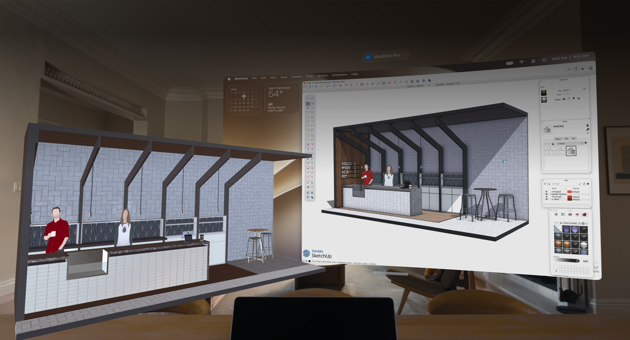 Apple Vision Pro 的顯示畫面中，MacBook Pro 放在桌面上，後方投射出 3D 模型，模型展示一張咖啡廳服務檯，櫃檯後方站著兩個人