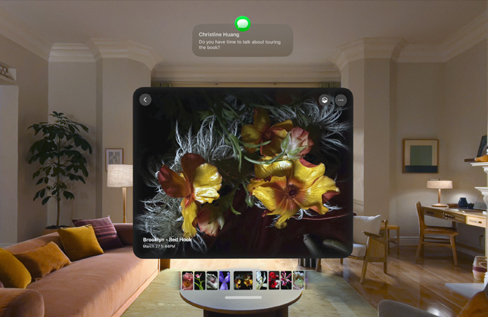Apple Vision Pro 展開關於新書宣傳巡迴的訊息，同時顯示花朵的圖片