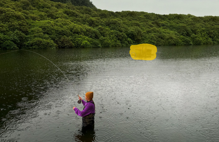 Photo of woman fly-fishing on lake, Pixelmator Pro tool removing unwanted objects